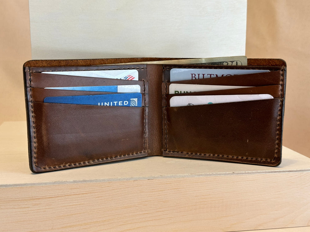 Our Glazed Bison Bi Fold Leather Wallet is handmade and hand stitched from high quality top grain solid leather.  It is a workhorse and makes a stylish statement from farm to table.  Perfect for your everyday carry and designed to last the test of time.