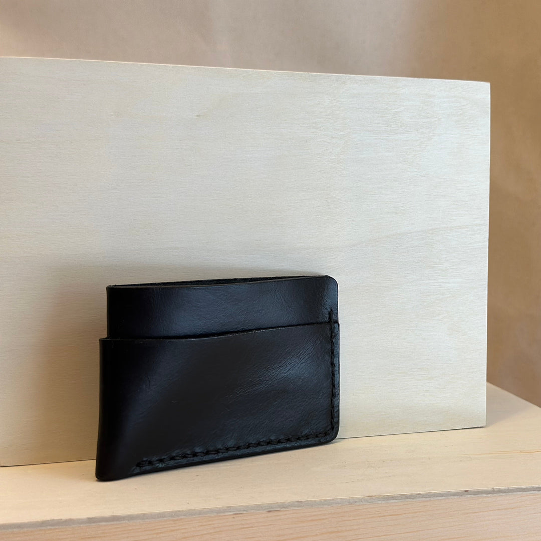Black Horizontal Leather Wallet is handstitched and built to last.