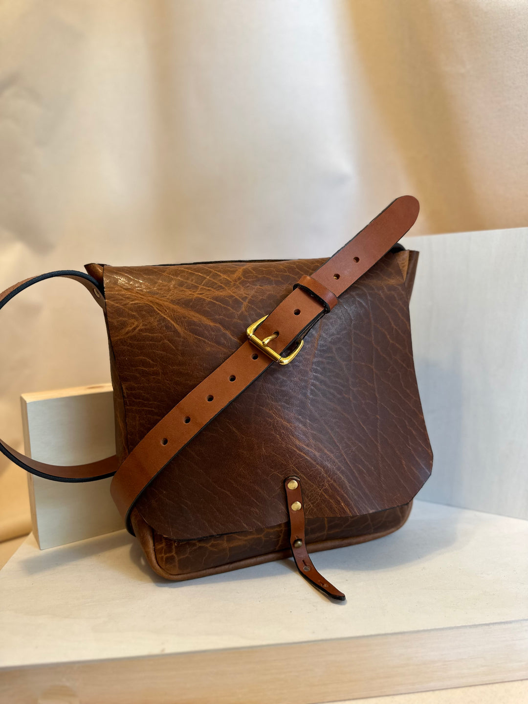 Shining Rock Goods large shrunken bison handmade leather crossbody handbag with brass hardware unisex light brown
