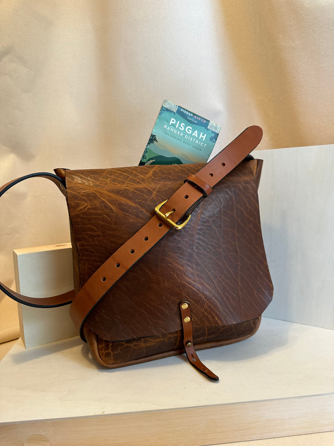 Shining Rock Goods large shrunken bison handmade leather crossbody handbag with brass hardware unisex light brown