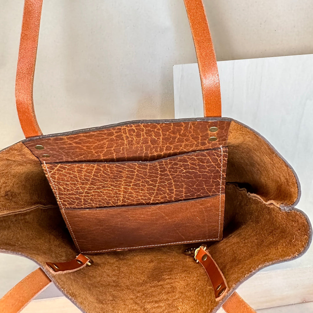 Our handmade Everyday Carry Large Glazed Bison Leather Tote Bag is a work of art, work horse, workin' it kinda bag.  Crafted from the highest quality, USA tanned, solid, top grain leather