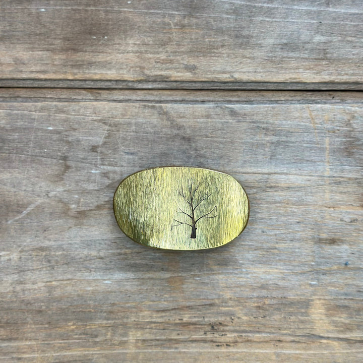 Oval solid brass "Tree" belt buckle by David M. Bowman made to fit an inch and a quarter belt.