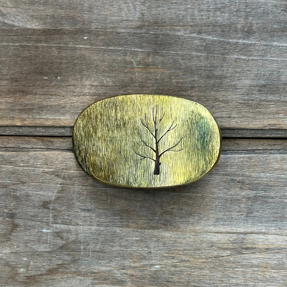Oval solid brass "Tree" belt buckle by David M. Bowman made to fit an inch and a quarter belt.