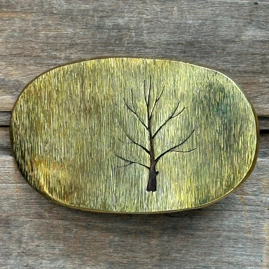 Oval solid brass "Tree" handmade belt buckle by David M. Bowman meant to fit an inch and a half belt.